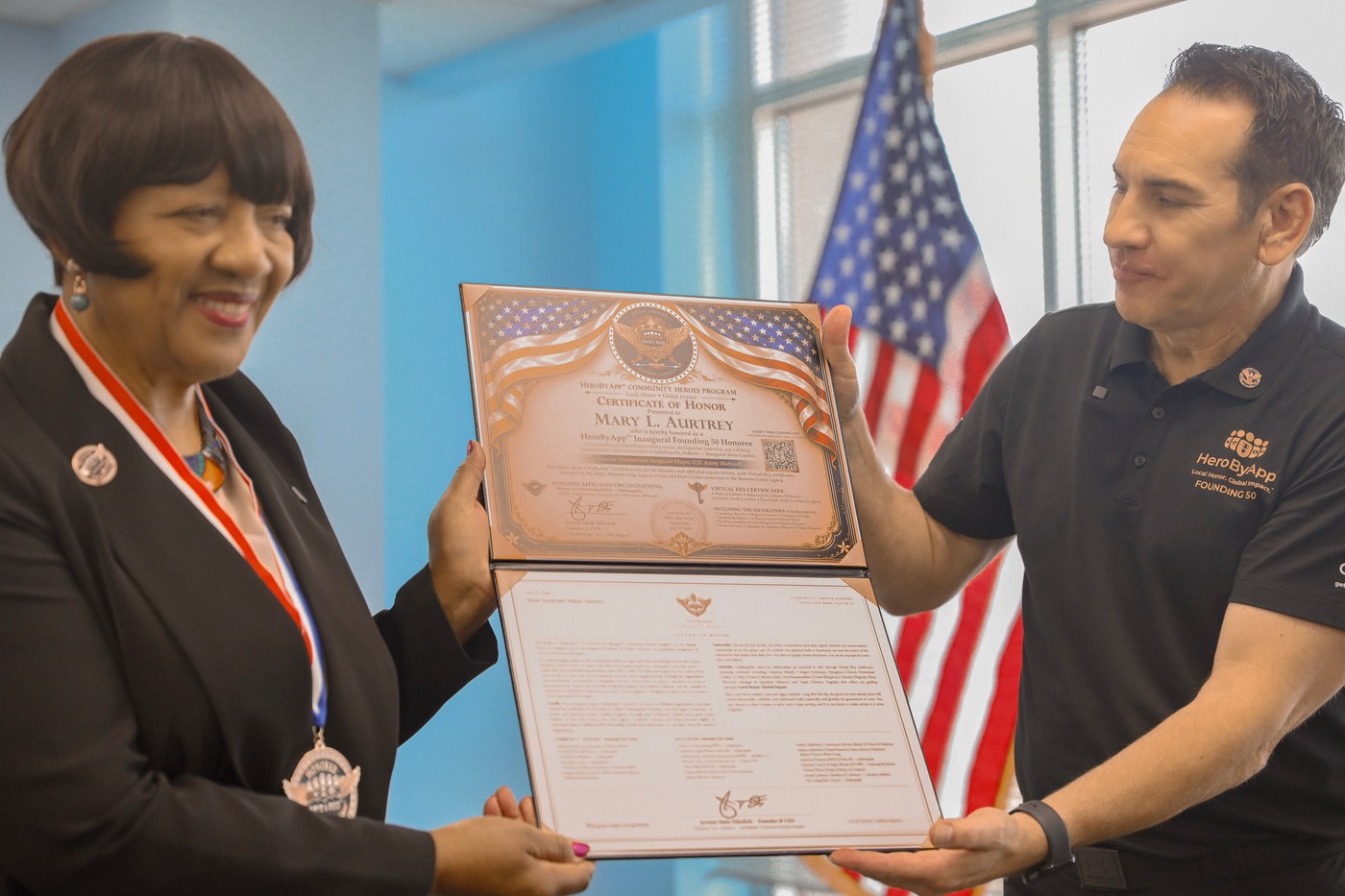 Jerome Mark Mikulich presents the Certificate of Honor to Mary L. Aurtrey