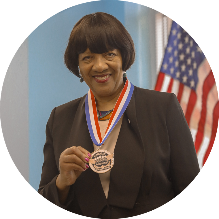 Sergeant Major Mary L. Aurtrey, U.S. Army (Retired), with the HeroByApp Honor Medal