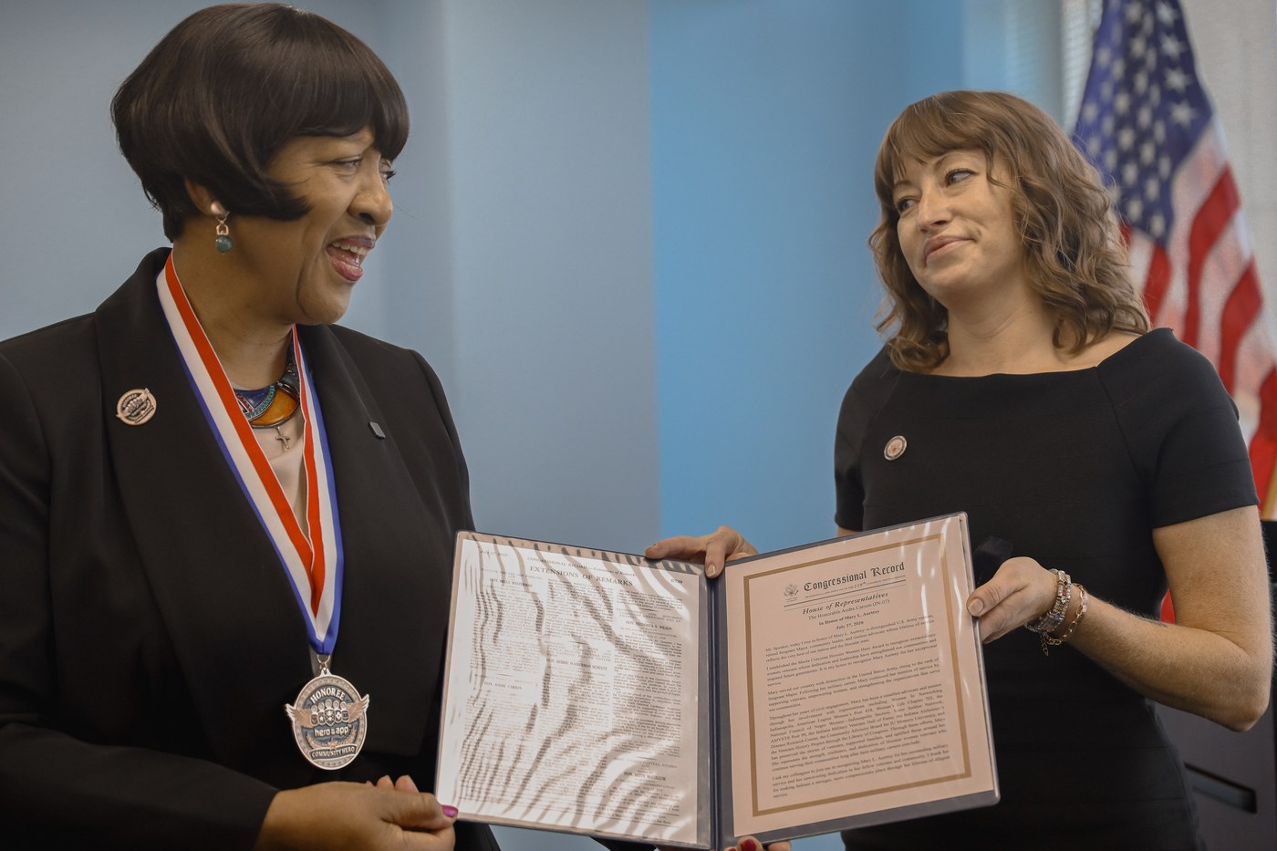 Heather Harvey presents Mary L. Aurtrey the Sheila Corcoran Hoosier Women Hero Award